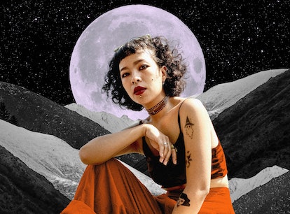 Young woman in front of a moon to show your October 2023 horoscope.